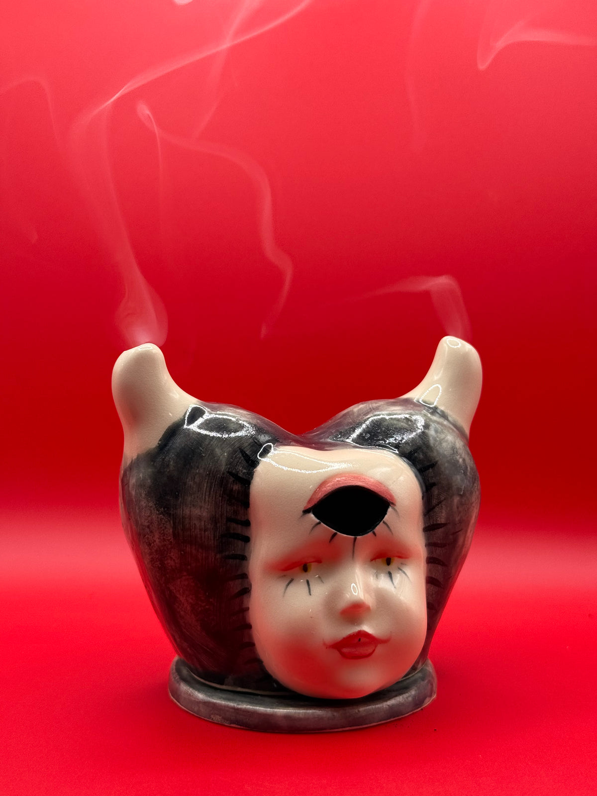 Doll face incense burner