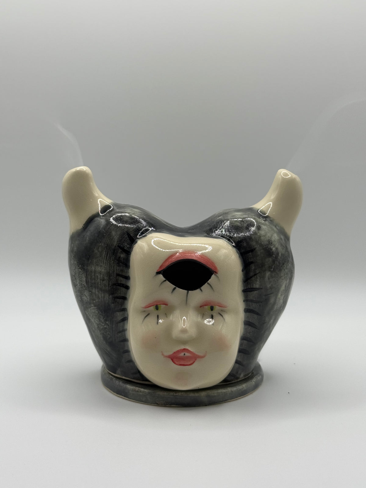 Doll face incense burner